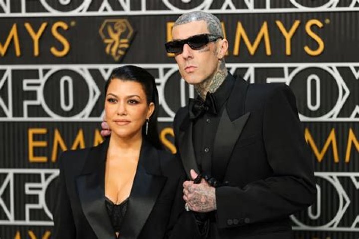 Kourtney Kardashian & Travis Barker Pack On The PDA For Fans At UFC 264 — Watch