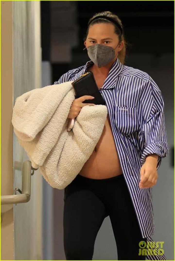 Pregnant Chrissy Teigen Shows Off Bare Bump In Bikini As Son Miles, 4, Swims In Cute Photo