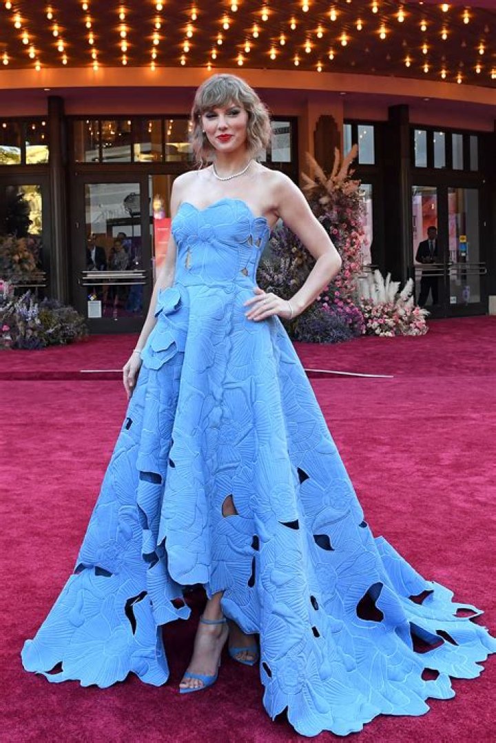 Regal In Blue Outfit – Hollywood Life